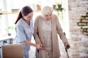 caregiver helping senior