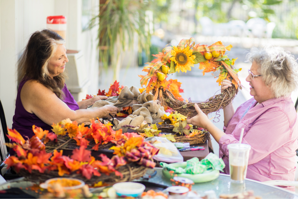 Seniors making colourful wreaths as part of their autumn activities in the Waterloo Region.