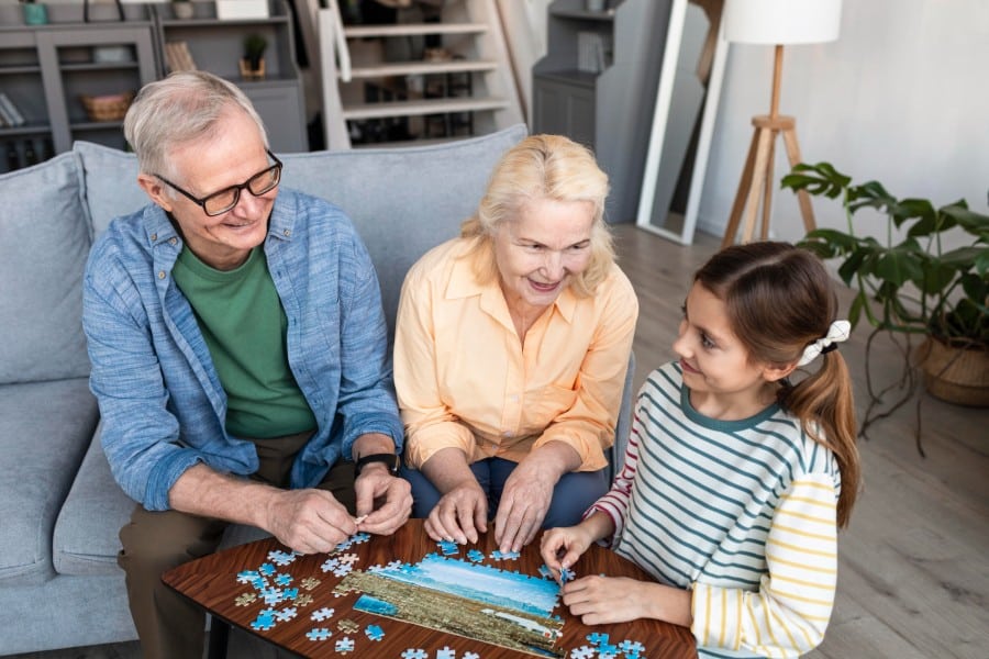 Family with Dementia seniors are engaging with their surroundings through meaningful activities that can stimulate cognitive function and improve mood.