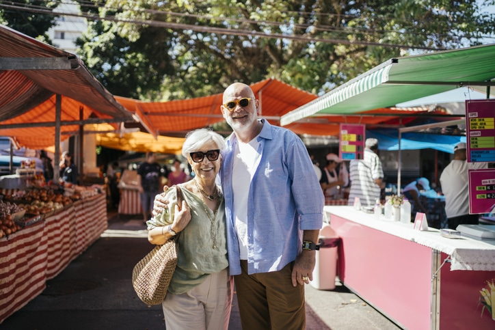 Seniors are enjoying life by staying active and choosing healthy foods for prevention of hearing loss.