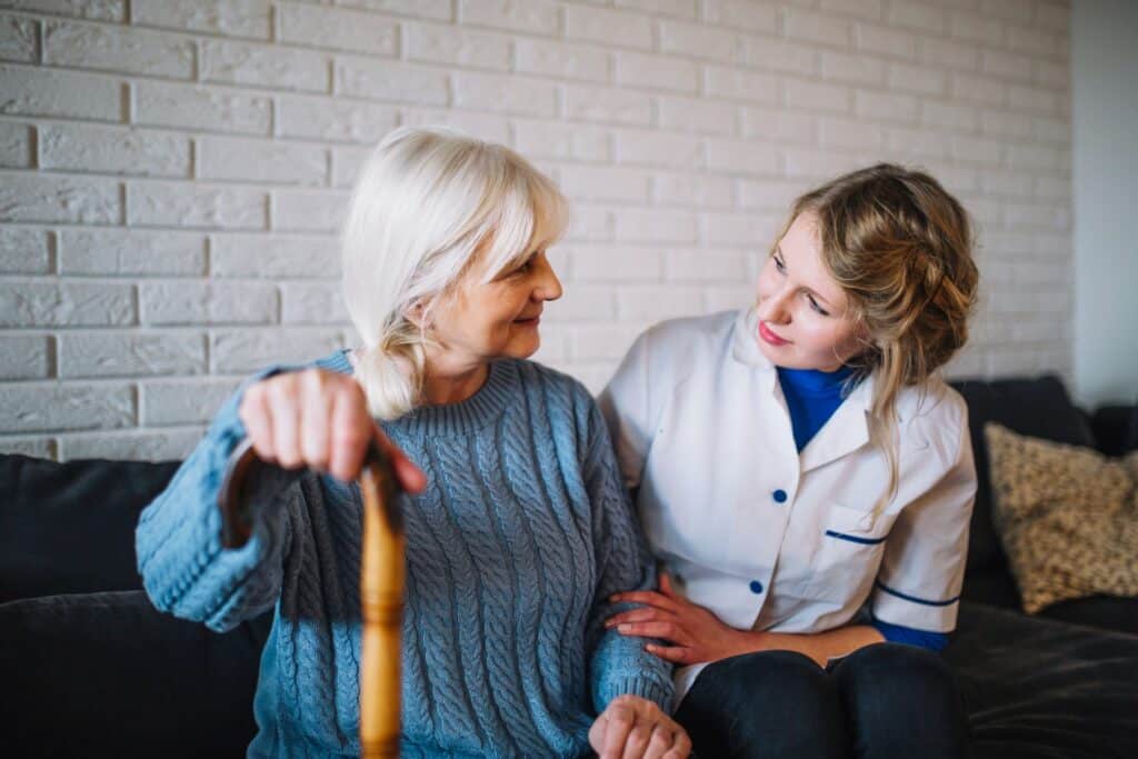 Senior woman is recovering from a recent stroke with the help of trained caregivers at Promyse Home Care.