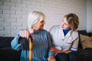 Senior woman is recovering from a recent stroke with the help of trained caregivers at Promyse Home Care.