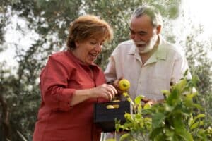Senior couple enjoy gardening and growing their own food.