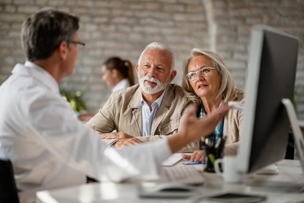 Senior couple is discussing what is needed for a Power of Attorney for Personal Care document