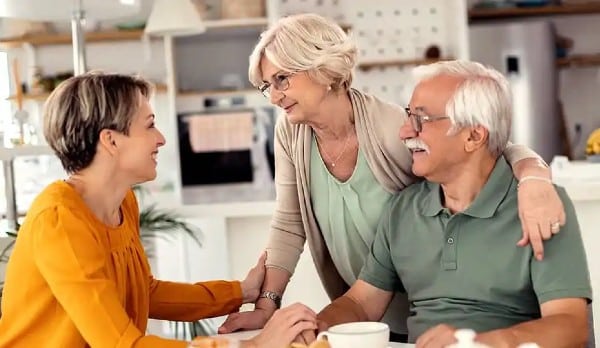 Family member discussing the future with parents to avoid complications in the future