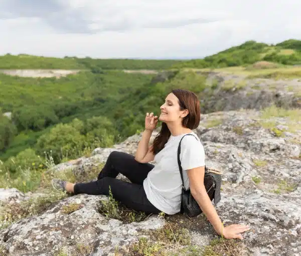 Caregiver enjoying nature to relax and reduce the stress that comes with taking care of others.