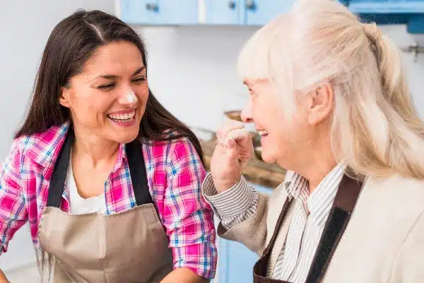 Caregivers bring a fresh perspective, when they engage seniors in stimulating activities like baking.