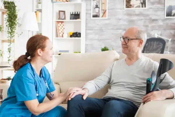 Caregiver helping Senior through an emergency situation.